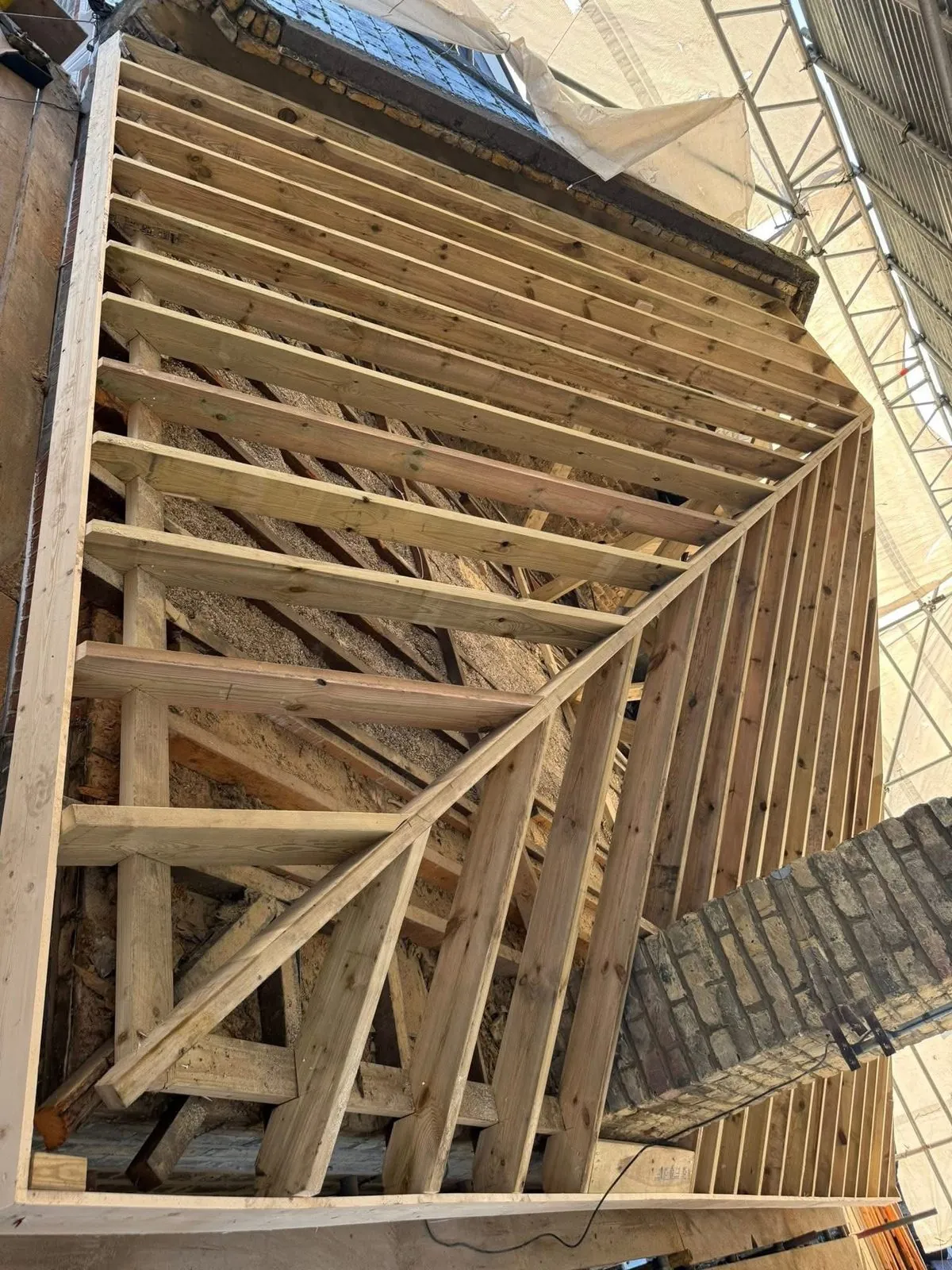 New roof timbers and rafters during a re-roof in St Agnes